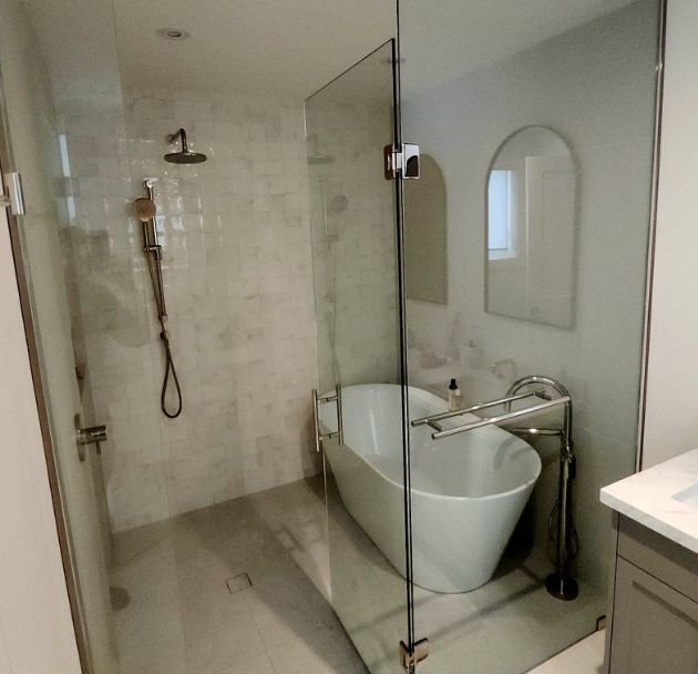 Walk-in shower bathroom renovation with modern tiles