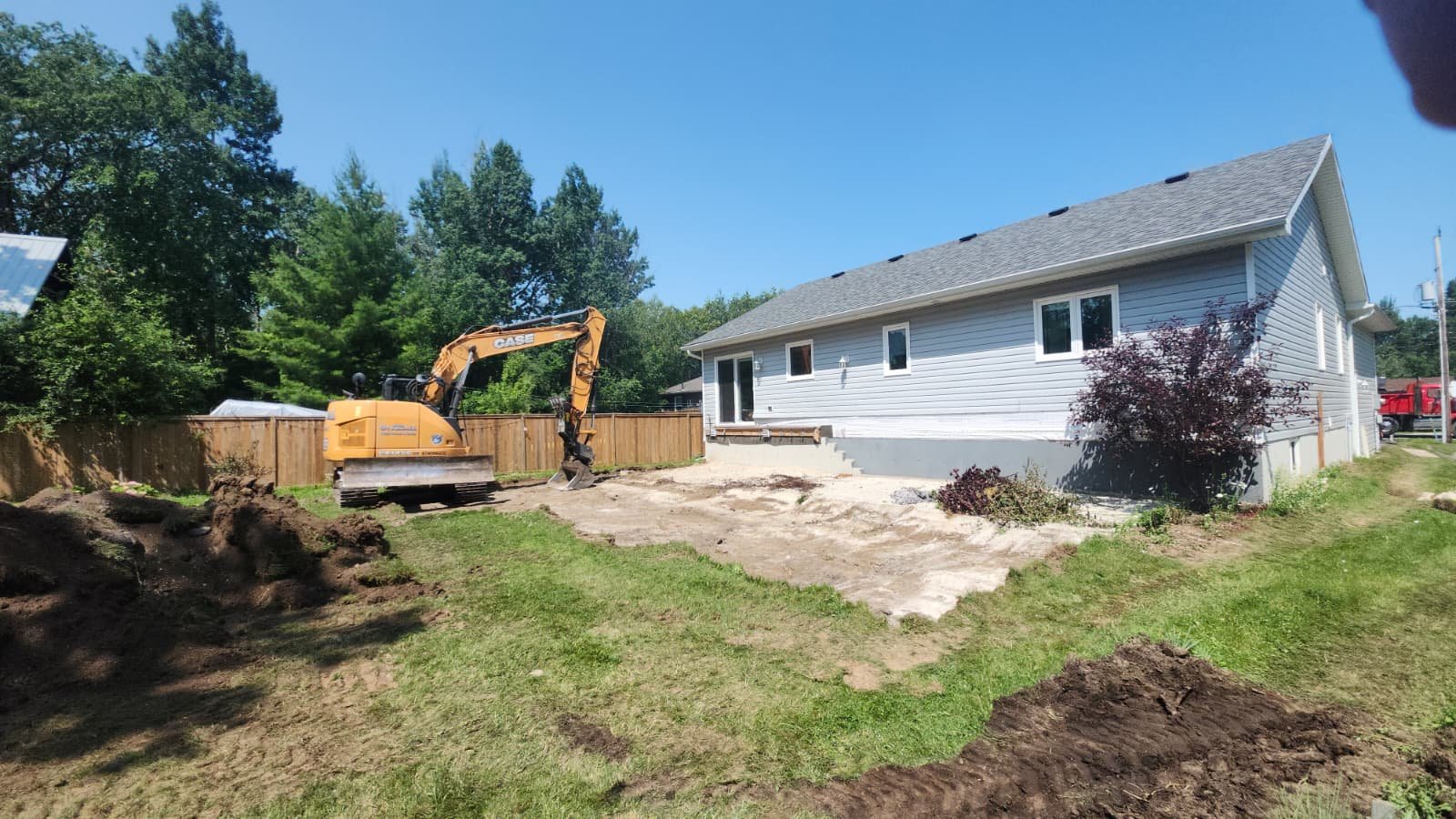 Construction site excavation work for new home foundation by Connacht Construction